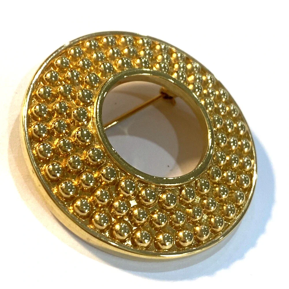 Vintage Swarovski brooch SAL goldtone textured open circle round retro pin 1980s